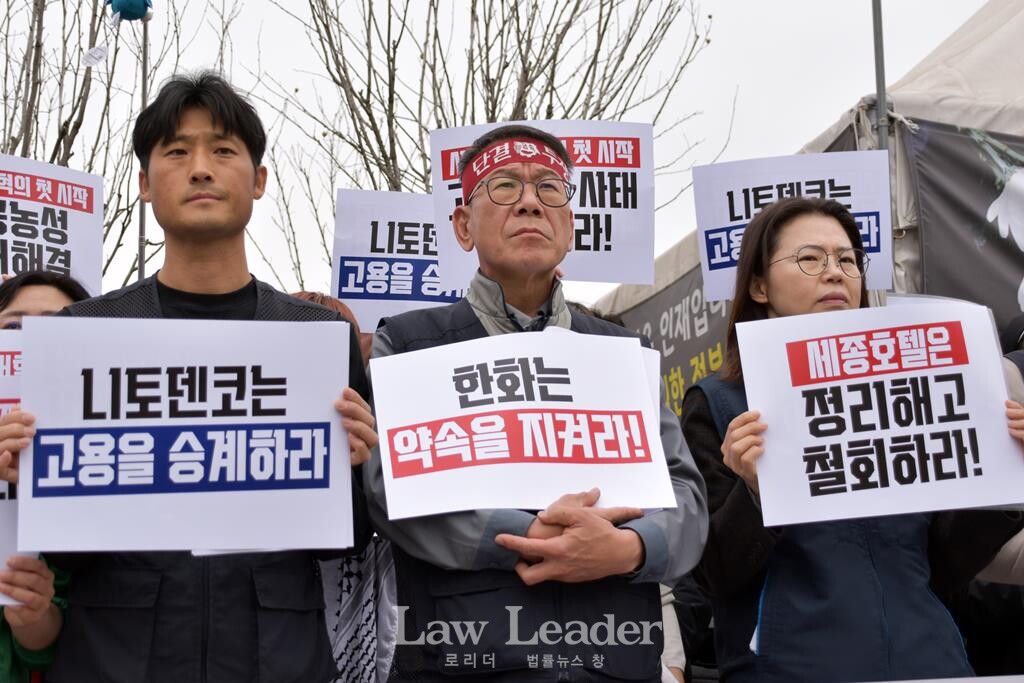 강인석 금속노조 거제통영고성조선하청지회 부지회장(가운데)